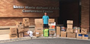 Allen Magie visits the Children’s Hospital at Saint Peter’s to drop off toys and games collected during his toy drive.