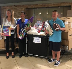 Allen Magie visits the Children’s Hospital at Saint Peter’s to drop off toys and games collected during his toy drive.