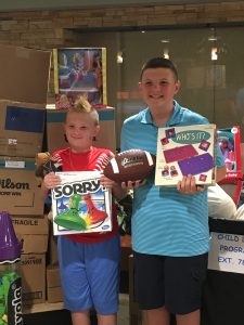 Allen Magie with friend and fellow hockey player, Matt Adonis, who inspired Allen’s Toy & Game Drive to benefit the Children’s Hospital at Saint Peter’s. 
