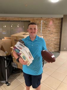 Allen Magie visits the Children’s Hospital at Saint Peter’s to drop off toys and games collected during his toy drive.