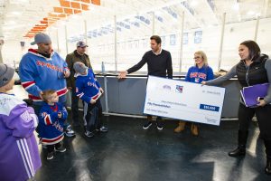 October 26, 2019: The Henrik Lundqvist Foundation, through GDF, presents a $50,000 check to Cohen Children’s Medical Center after the Rangers practice at the MSG Training Center.