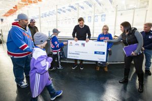 October 26, 2019: The Henrik Lundqvist Foundation, through GDF, presents a $50,000 check to Cohen Children’s Medical Center after the Rangers practice at the MSG Training Center.