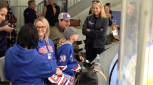 Henrik began Hockey Fights Cancer Month by inviting Cohen Children's Medical Center kids to practice so he could present them with a grant that will help to provide them with the best possible post-treatment experience.